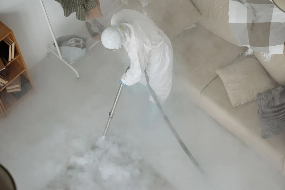 Biohazard cleanup technician in protective equipment, Bedford Heights, OH